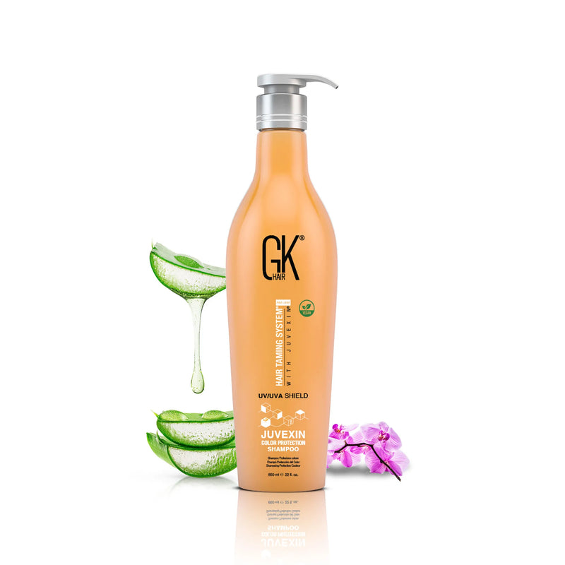 GK Hair Juvexin Color Protection Shampoo 650 ml orange pump bottle, front view, aloe vera at left, purple orchid at right