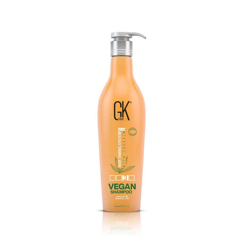 GK Hair Vegan Shampoo 650 ml peach bottle with a silver pump, front view on white