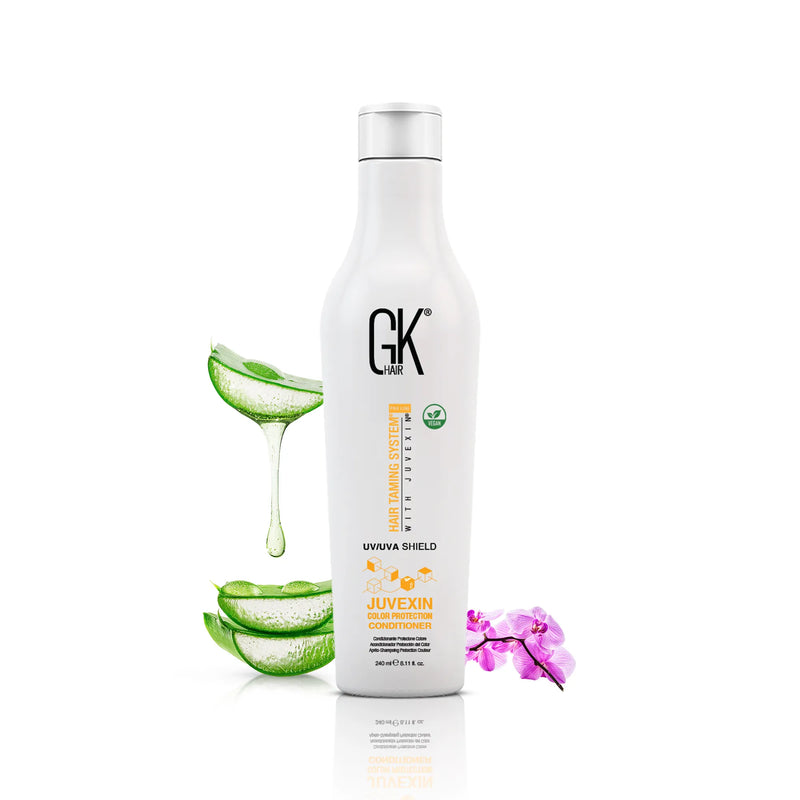 GK Hair Shield Shampoo and Conditioner: the white 240 ml Juvexin Color Protection Conditioner shown alone with aloe and an orchid